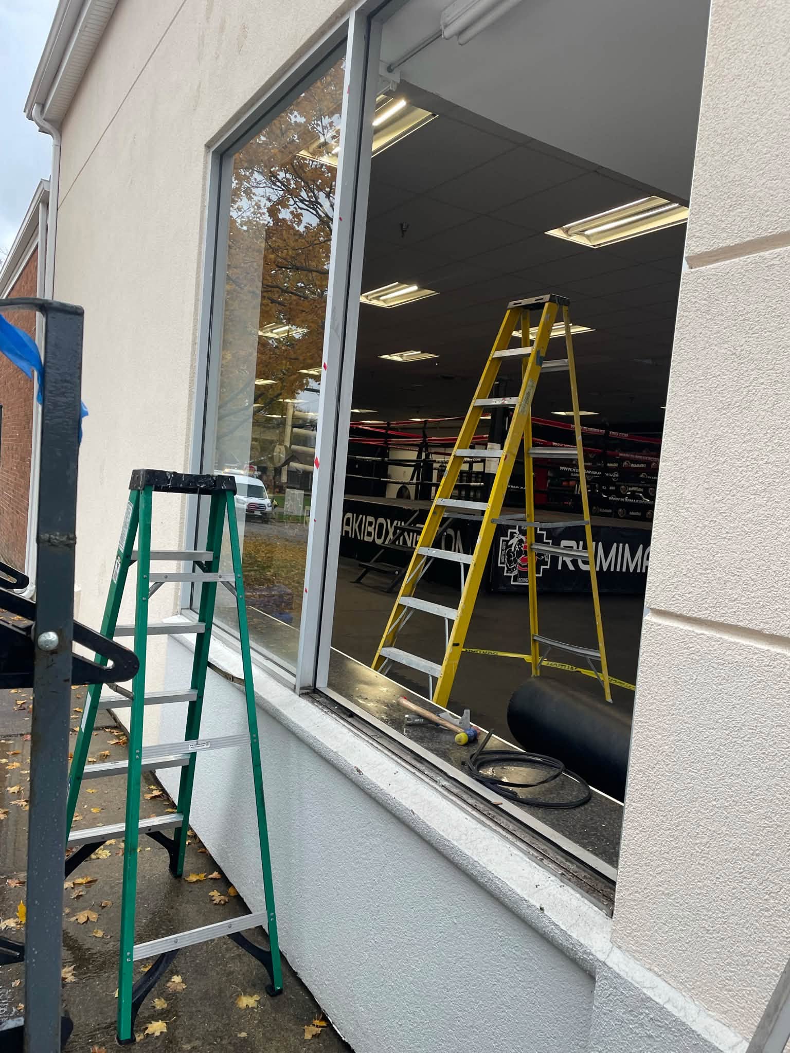 Window glass work being carried out at a property